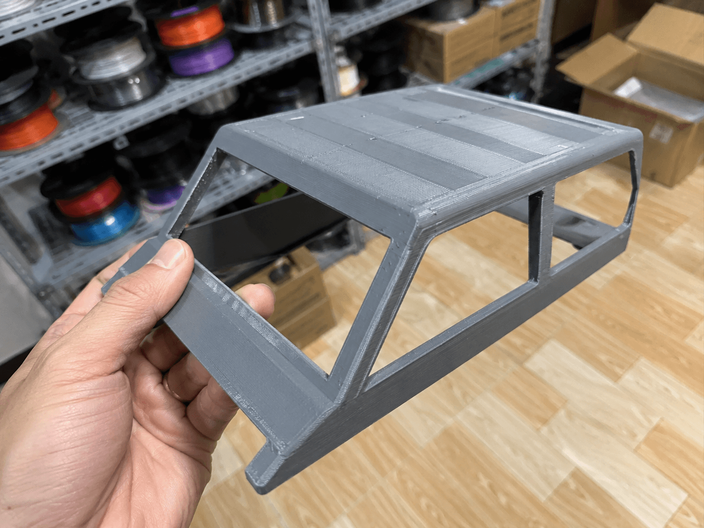 3D-printed car part in workshop