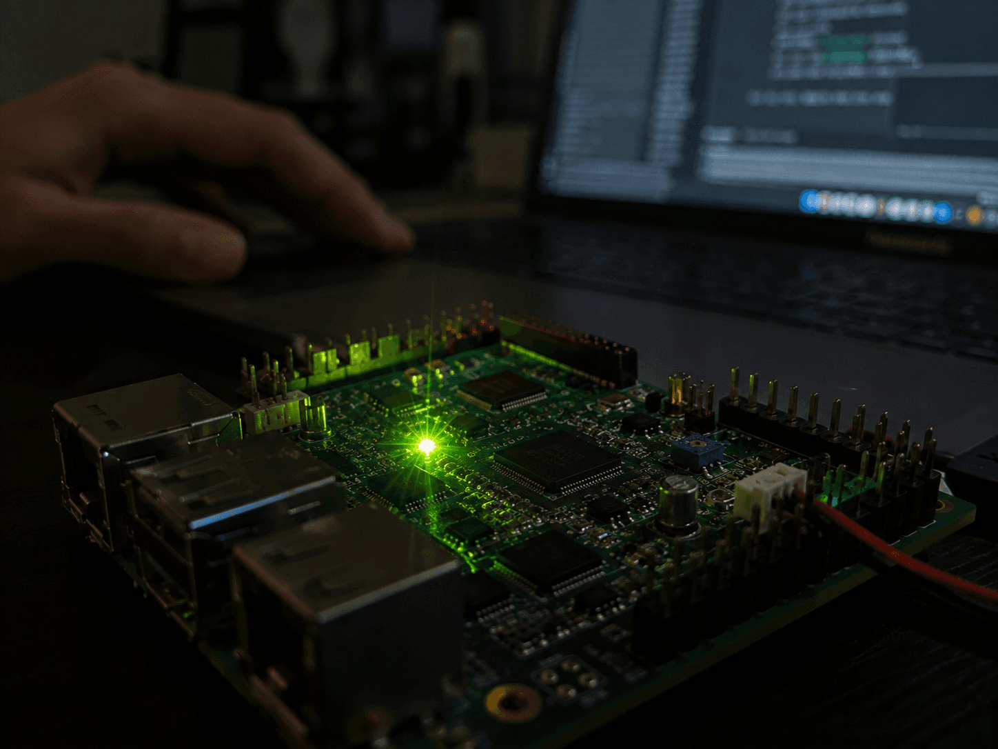 Tech workspace with glowing circuit board