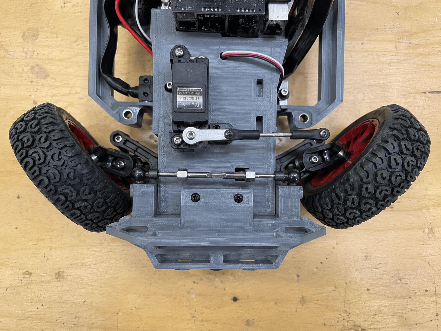 RC car front end assembly close-up